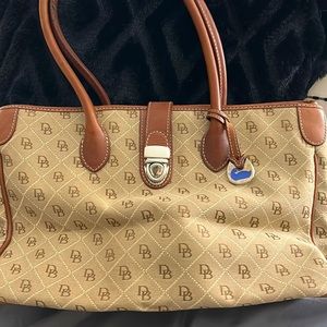 Dooney and Bourke classic tote. Medium size. Tan and brown leather